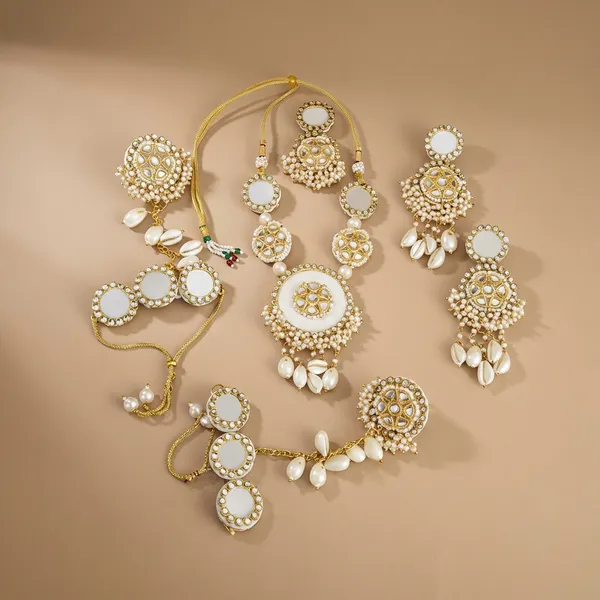 Traditional_White_And_Gold_Beaded_Statement_Necklace_With_Ornate_Medallion_Pendants