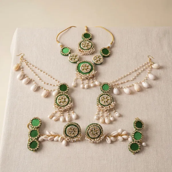 Green_Stone_Kundan_Jewellery_Set_With_Pearls_|_Necklace_Earrings_Maang_Tikka_And_Hand_Harness