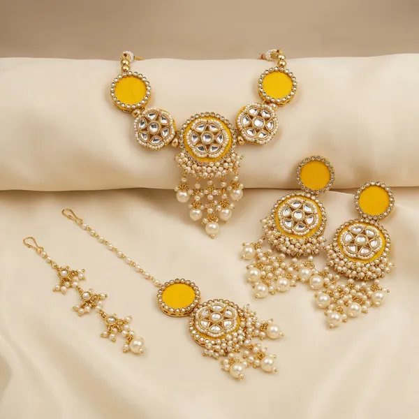 Traditional_Gold_Toned_Kundan_Pearl_Jewelry_Set_With_Jhumka_Earrings_And_Maang_Tikka