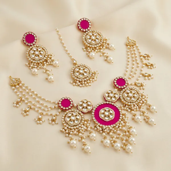Traditional_Pink_Stone_And_Pearl_Bridal_Jewelry_Set_With_Maang_Tikka_And_Earrings