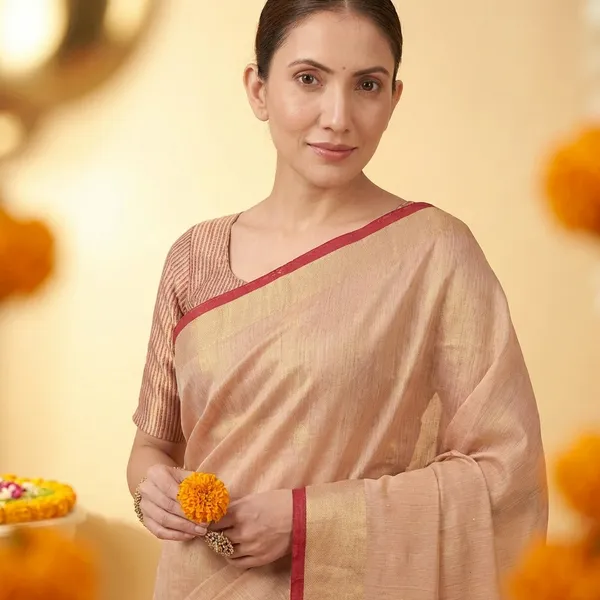 Peach_Silk_Golden_Border_And_Tassels_Saree_With_Blouse_Piece_For_Women