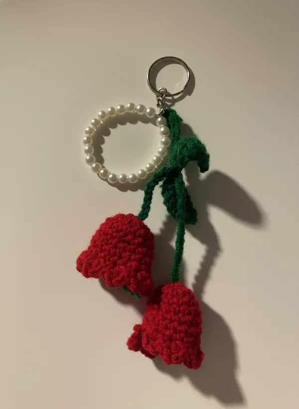 Handmade_Crochet_Red_Tulip_Keychain_With_Pearl_Handle_|_Hanging_Flower_Bag_Charm_|_Cute_Aesthetic_Key_Ring_For_Girls_|_Soft_Yarn_Floral_Accessory,_Pack_of_2