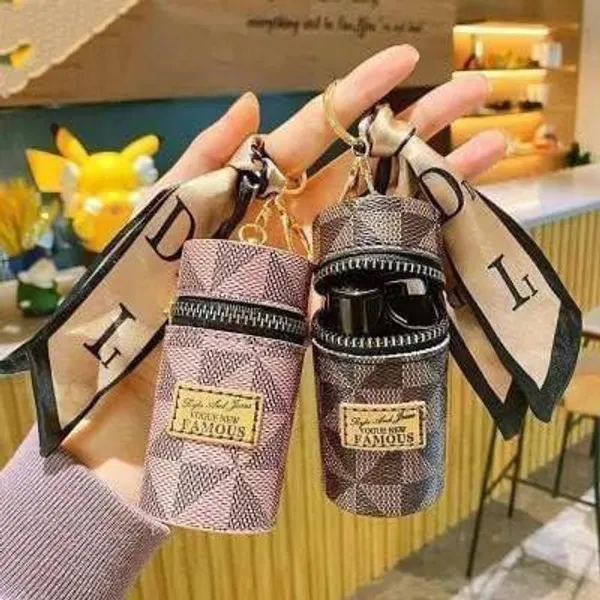 Pack_of_2_-_Mini_Leather_Bag_Keychain_|_Multipurpose_Travel_Keyring_For_Car/Scooty/Bikes/Home_|_Lipstick/Lipbalm/Coin_Organizer_Bag_|_Portable_Makeup_Storage_Holder