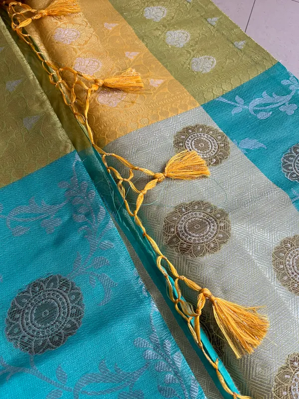 Turquoise_And_Golden_Yellow_Banarasi_Silk_Saree_With_Silver_Butta_Motifs