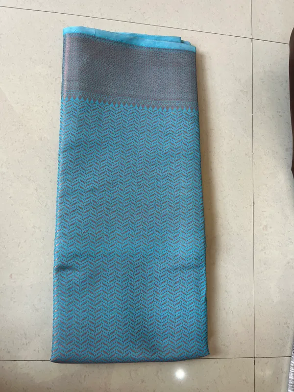 Sky_Blue_Tanchoi_Silky_Banarasi_Saree_With_All-Over_Woven_Pattern_And_Elegant_Border