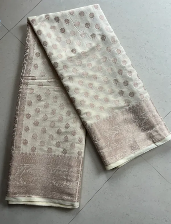 Ivory_Semi_Katan_Banarasi_Saree_With_Antique_Zari_Buti_And_Rich_Woven_Border