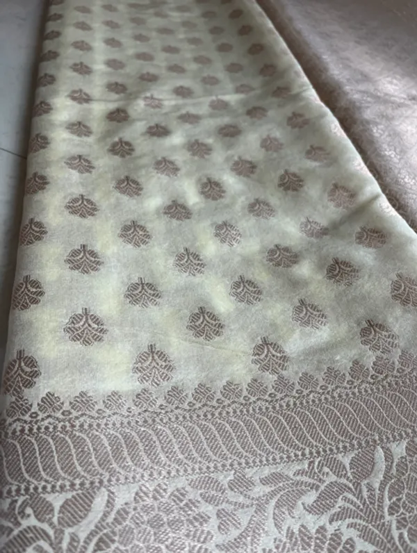 Ivory_Semi_Katan_Banarasi_Saree_With_Antique_Zari_Buti_And_Rich_Woven_Border