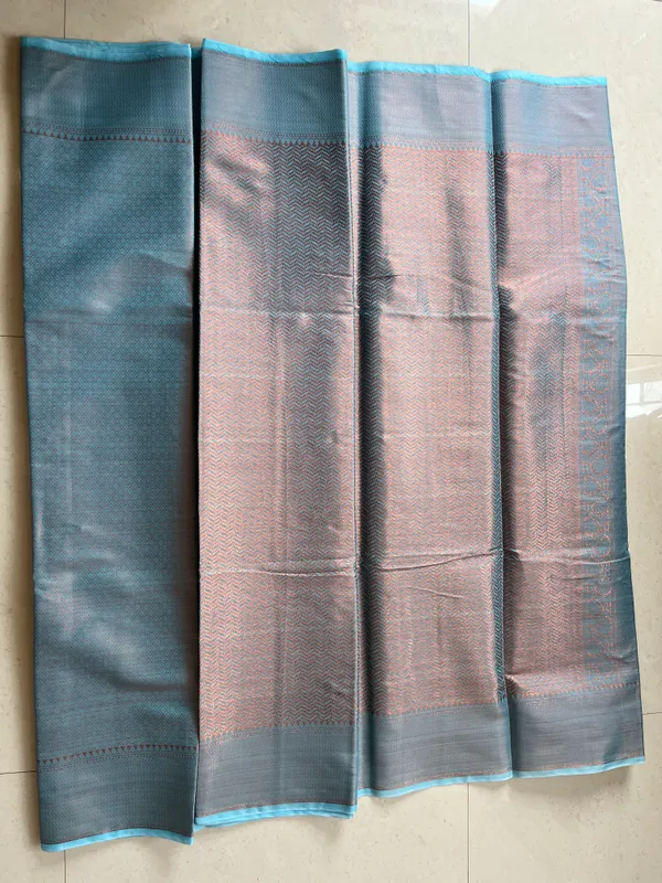 Sky_Blue_Tanchoi_Silky_Banarasi_Saree_With_All-Over_Woven_Pattern_And_Elegant_Border