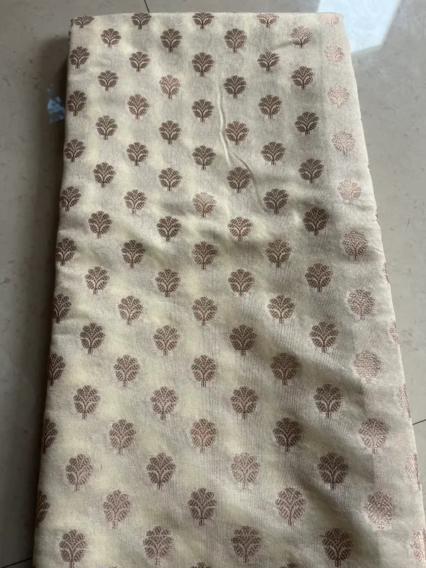Ivory_Semi_Katan_Banarasi_Saree_With_Antique_Zari_Buti_And_Rich_Woven_Border