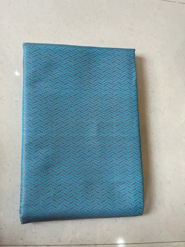 Sky_Blue_Tanchoi_Silky_Banarasi_Saree_With_All-Over_Woven_Pattern_And_Elegant_Border