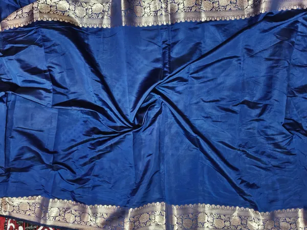 Noorika_Royale_Blue_Tissue_Silk_Banarasi_Saree_with_Zari_Floral_Weave_and_Lace_Work