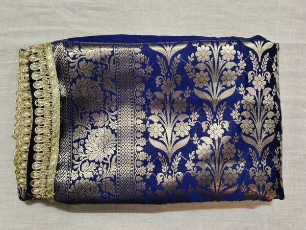 Noorika_Royale_Blue_Tissue_Silk_Banarasi_Saree_with_Zari_Floral_Weave_and_Lace_Work