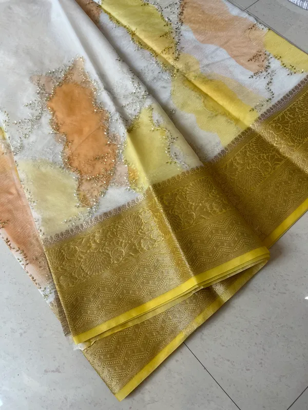 Sunlit_Pastel_Organza_Rangkat_Saree_With_Embroidery_And_Zari_Border