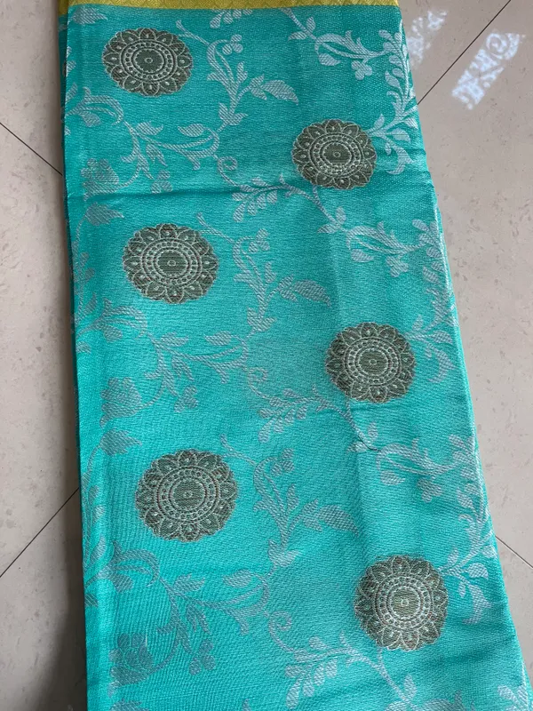 Turquoise_And_Golden_Yellow_Banarasi_Silk_Saree_With_Silver_Butta_Motifs