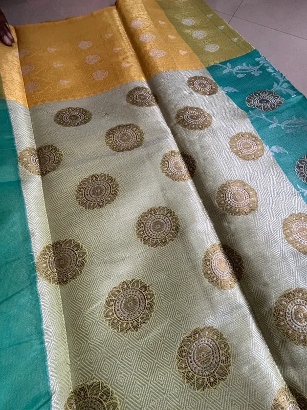 Turquoise_And_Golden_Yellow_Banarasi_Silk_Saree_With_Silver_Butta_Motifs
