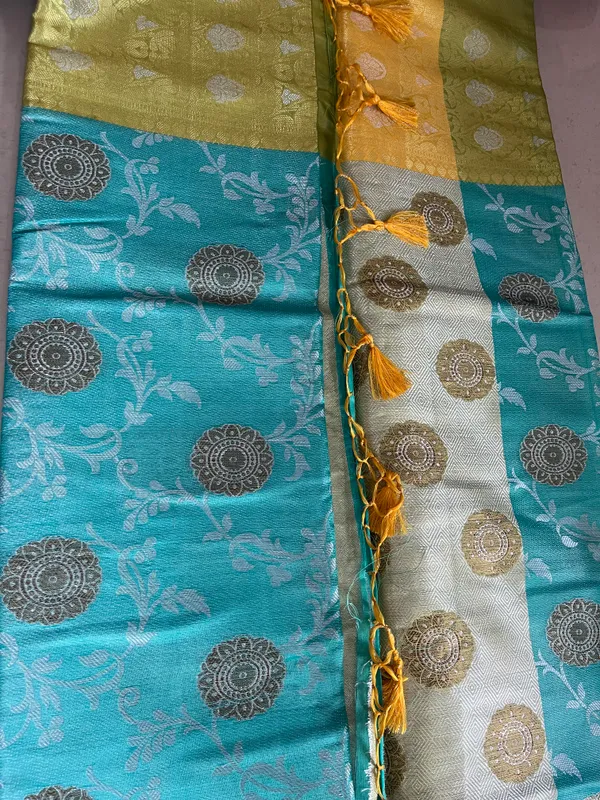 Turquoise_And_Golden_Yellow_Banarasi_Silk_Saree_With_Silver_Butta_Motifs