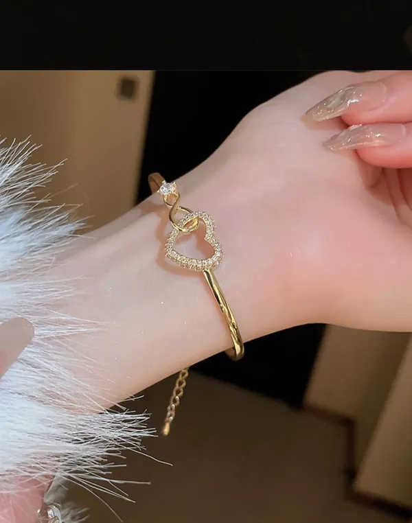 Gold_Tone_Heart_Bangle_Bracelet_With_Crystal_Embellishments_For_Women