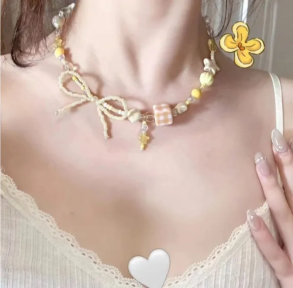 Cream_And_Yellow_Beaded_Flower_Charm_Necklace_With_Bow_For_Women