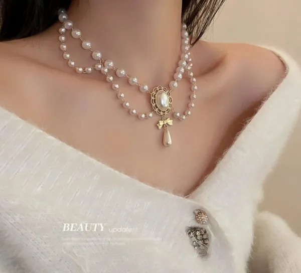 Elegant_Pearl_Choker_Necklace_With_Teardrop_Pendant_For_Women