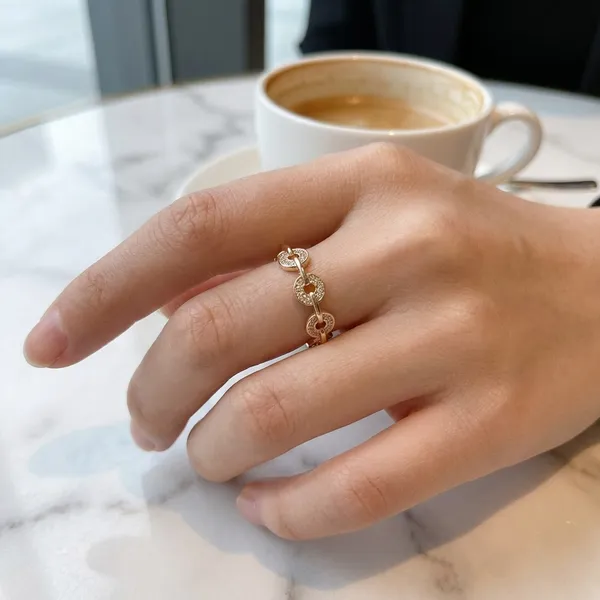 Elegant_Clover_Gold_Tone_Ring_With_Crystal_Accents_For_Women