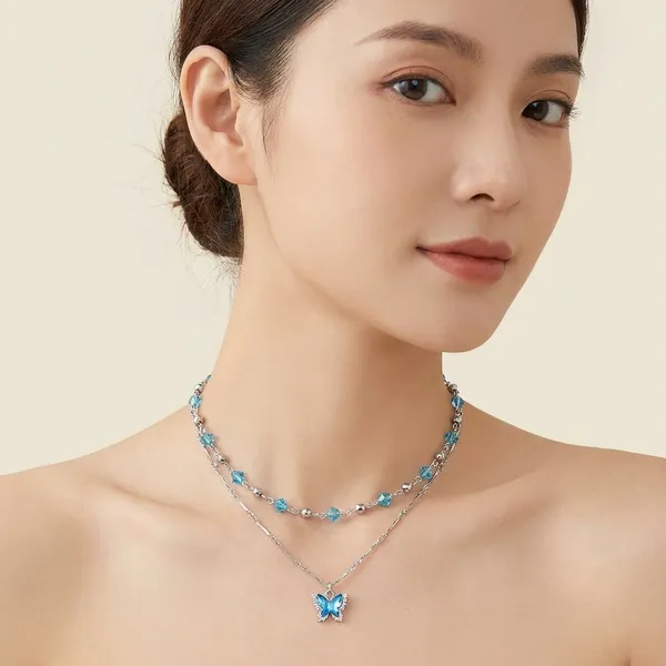 Silver_Tone_Crystal_Snowflake_Pendant_Layered_Necklace_With_Blue_Accents_For_Women
