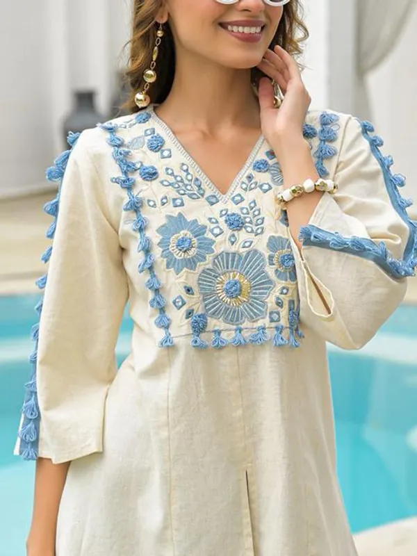 Off_White_Cream_Embroidered_Tunic_With_Floral_Details_And_Tassel_Trim_For_Women