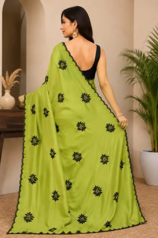 HAND_WASH_AND_MASHINE_WASH_Vastravedamtrendy_Green_Silk_Saree_Featuring_Black_Floral_Motifs_for_Women