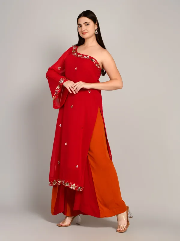 Hot_pink_and_rust_one_shoulder_kurti_with_flared_plazo_