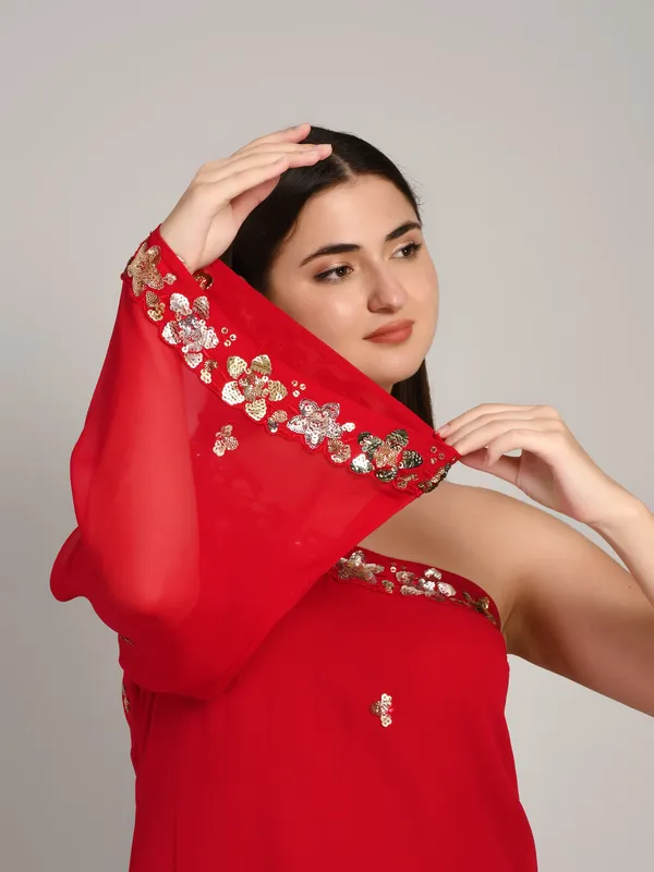 Hot_pink_and_rust_one_shoulder_kurti_with_flared_plazo_