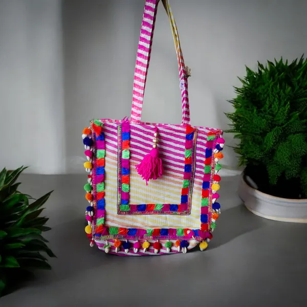 Pink_Large_Size_Pom_Pom_Lace_Bag_In_Pink_Leheriya_Silk_For_Women