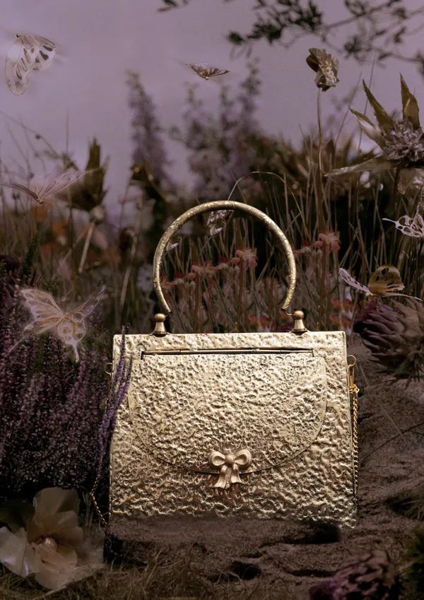 Gold_Triangle_Hammered_Brass_Bow_Bag_In_Gold_Shade_For_Women