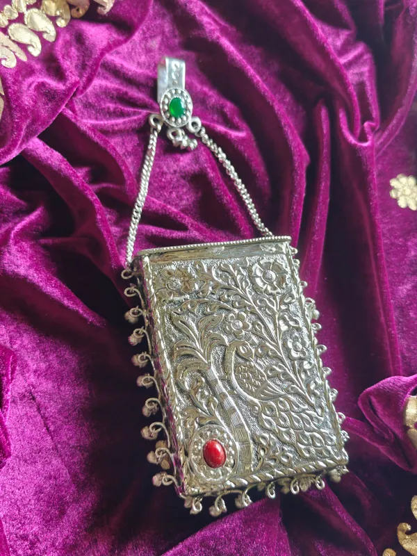 Silver_Handcrafted_Peacock_Brass_Silver_Festive_Mobile_Pouch_For_Women
