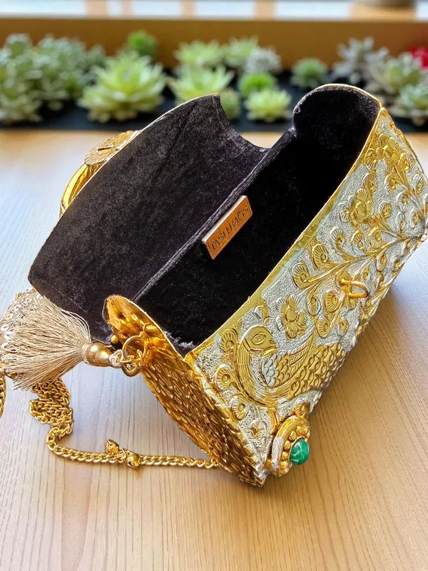Gold_Peacock_Engraved_Dual_Tone_Brass_Bag_With_Tassels_For_Women