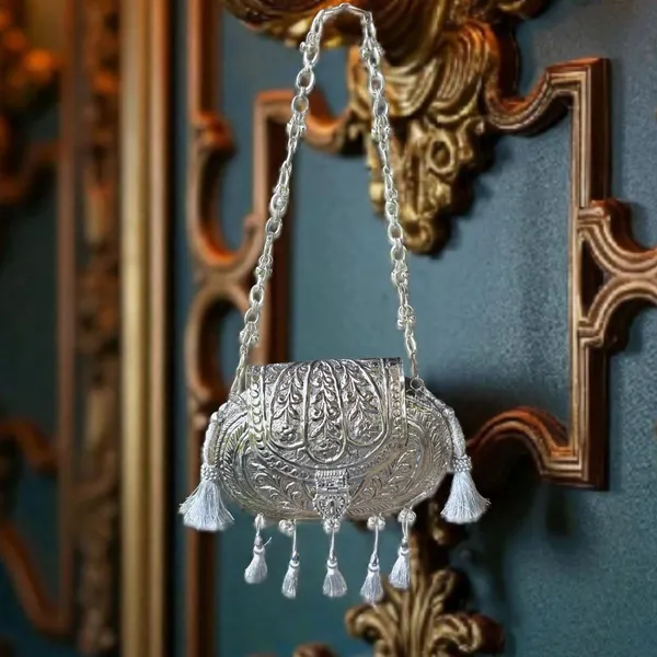 Silver_Oval_Ethnic_Handbag_In_Silver_Shade_Tassels_And_Ornate_Ghungroo_Sling_Chain_For_Women