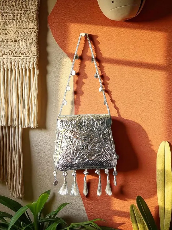 Silver_Ornate_Silver_Tassels_Bag_With_Coins_And_Ghungroo_Latkans_For_Women