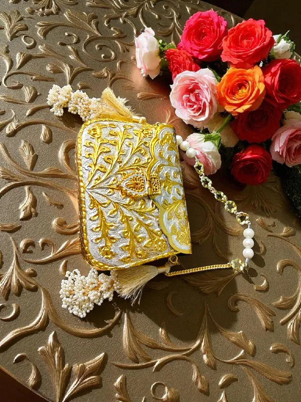 Gold_Dual_Tone_Rectangular_Gold_Silver_Floral_Engraved_Brass_Handbag_With_Side_Tassels_For_Women