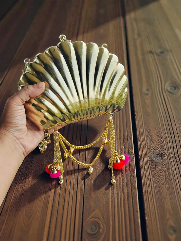 Gold_The_Shell_Heritage_Brass_Ghungroo_Bag_In_Gold_Tone_For_Women