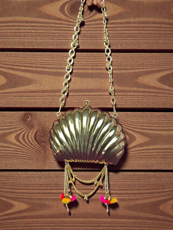 Gold_The_Shell_Heritage_Brass_Ghungroo_Bag_In_Gold_Tone_For_Women
