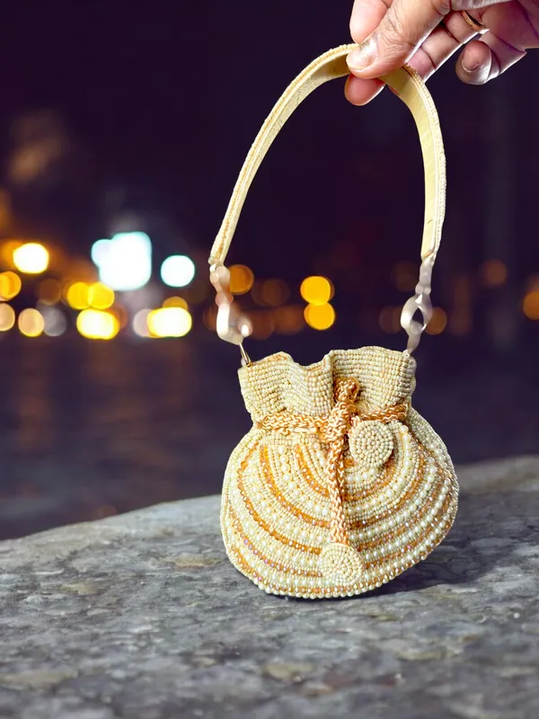 White_The_Mini_Embroidered_Potli_In_Beads_Crystals_And_Pearls_For_Women