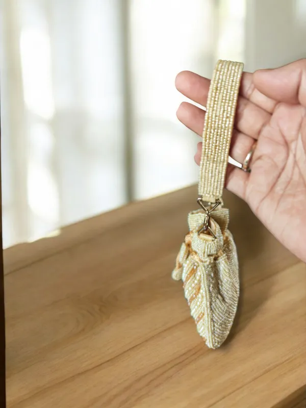 White_The_Mini_Embroidered_Potli_In_Beads_Crystals_And_Pearls_For_Women
