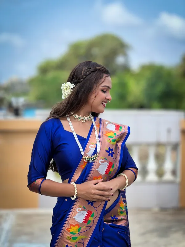 Blue_Soft_Pethani_Silk_Saree_With_Zari_Weaving_Motifs_Design_And_Meenakari_Weaving_Rich_Pallu_With_Meenakari_Weaving_Border_And_Tassels_Attached_At_Pallu_End_Blouse_For_Women