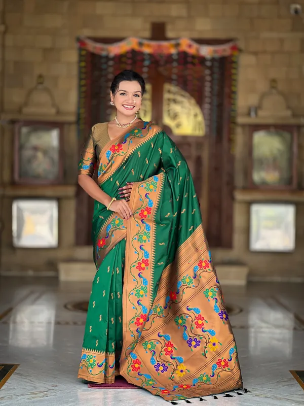 Green_Soft_Paithani_Silk_Saree_With_Zari_Weaving_Meenakari_Motifs_Design_And_Meenakari_Weaving_Rich_Pallu_With_Meenakari_Weaving_Border_And_Tassels_Attached_At_Pallu_And_Blouse_For_Women