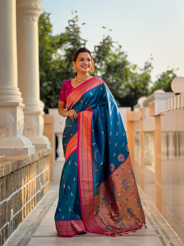 Sky_Blue_Soft_Pethani_Silk_Saree_With_Zari_Weaving_Motifs_Design_And_Meenakari_Weaving_Rich_Pallu_With_Meenakari_Weaving_Border_And_Tassels_Attached_At_Pallu_End_Blouse_For_Women