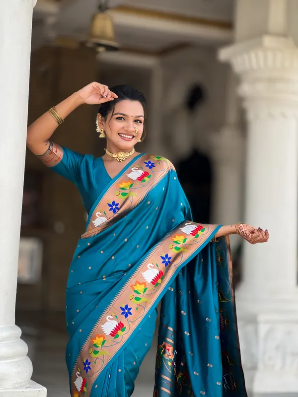 Firozi_Soft_Pethani_Silk_Saree_With_Zari_Weaving_Motifs_Design_And_Meenakari_Weaving_Rich_Pallu_With_Meenakari_Weaving_Border_And_Tassels_Attached_At_Pallu_End_Blouse_For_Women