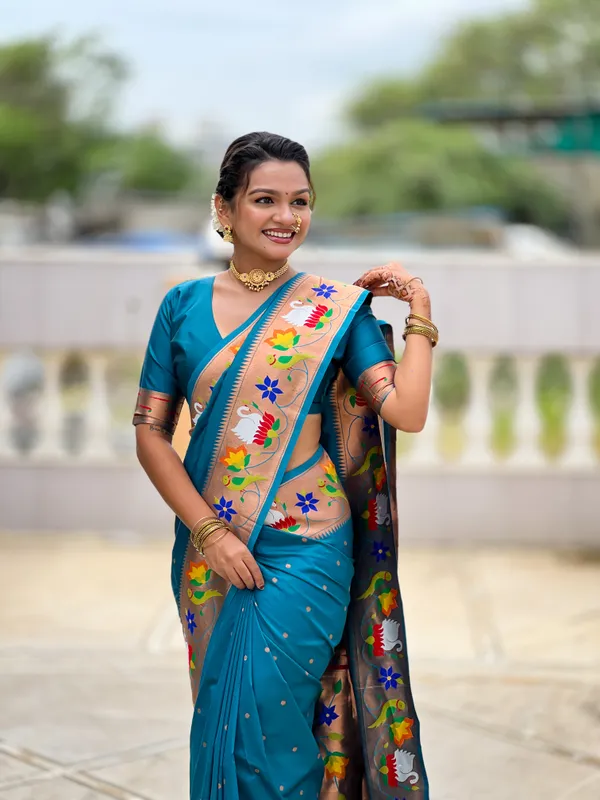 Firozi_Soft_Pethani_Silk_Saree_With_Zari_Weaving_Motifs_Design_And_Meenakari_Weaving_Rich_Pallu_With_Meenakari_Weaving_Border_And_Tassels_Attached_At_Pallu_End_Blouse_For_Women