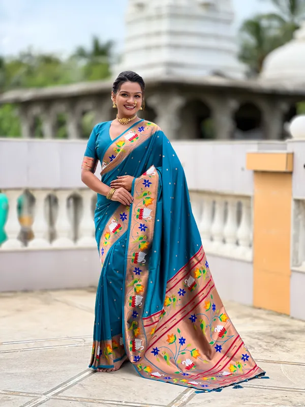 Firozi_Soft_Pethani_Silk_Saree_With_Zari_Weaving_Motifs_Design_And_Meenakari_Weaving_Rich_Pallu_With_Meenakari_Weaving_Border_And_Tassels_Attached_At_Pallu_End_Blouse_For_Women