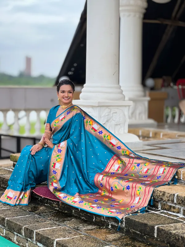 Firozi_Soft_Pethani_Silk_Saree_With_Zari_Weaving_Motifs_Design_And_Meenakari_Weaving_Rich_Pallu_With_Meenakari_Weaving_Border_And_Tassels_Attached_At_Pallu_End_Blouse_For_Women