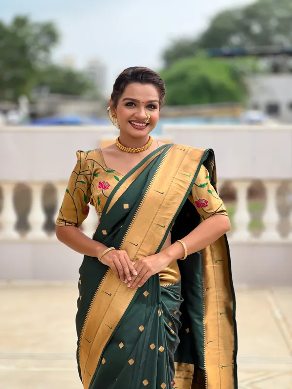 Green_Soft_Pethani_Silk_Saree_With_Zari_Weaving_Motifs_Design_And_Meenakari_Weaving_Rich_Pallu_With_Meenakari_Weaving_Double_Munia_Border_And_Tassels_Attached_At_Pallu_End_Blouse_For_Women