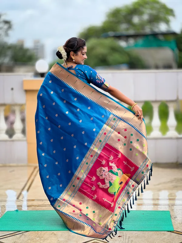 Firozi_Soft_Pethani_Silk_Saree_With_Zari_Weaving_Motifs_Design_And_Meenakari_Weaving_Rich_Pallu_With_Meenakari_Weaving_Munia_Border_And_Tassels_Attached_At_Pallu_End_Blouse_For_Women