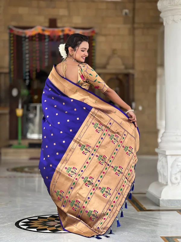 Navy_Blue_Soft_Pethani_Silk_Saree_With_Zari_Weaving_Motifs_Design_And_Meenakari_Weaving_Rich_Pallu_With_Meenakari_Weaving_Double_Munia_Border_And_Tassels_Attached_At_Pallu_End_Blouse_For_Women